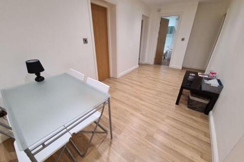 A bright and clean contemporary living room wit...