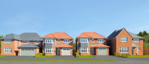 A row of modern detached houses with brick exteriors, bay windows, and colourful roofs under a clear