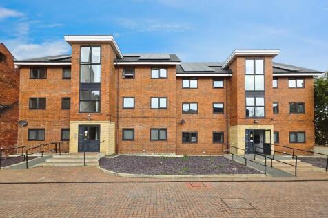Modern 2-bed first-floor flat with open plan living, integrated kitchen, Juliette balcony, parking, great transport links, and local amenities. Available 30th July. Book your viewing today.