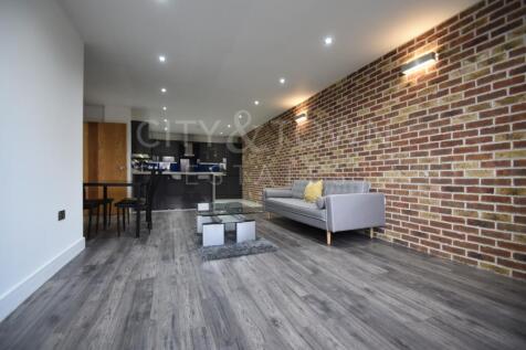 Larger than average and ideally located beside Mile End Park, this stylish apartment offers two double bedrooms, two modern bathrooms, a spacious living room, and a fully fitted kitchen with dining ar