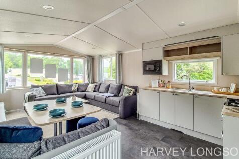 Open plan lounge and kitchen in the Swift Loire ho