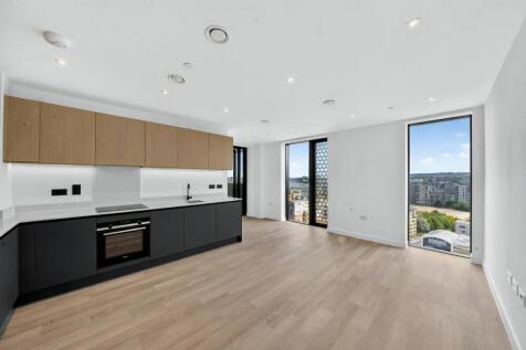 A brand new, never lived in, furnished apartment on Greenwich Peninsula with floor-to-ceiling windows, private balcony overlooking the Thames and Greenwich rooftops, concierge, residents' lounge, and