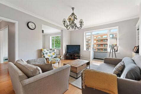 Finished to an exceptionally high standard, this modern, bright three double bedroom apartment boasts beautiful colour schemes throughout, solid wood flooring, high ceilings and large rooms flooded wi
