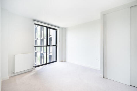 Experience the tranquility of this bright and airy modern room, designed for peace and comfort.