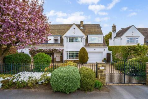 Located in the prestigious Tranmere Park area of Guiseley, this stunning detached family home offers spacious, extended accommodation ideal for modern living. The ground floor features a large sitting