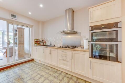 KITCHEN, UTILITY ROOM, DINER AND LIVING ROOM