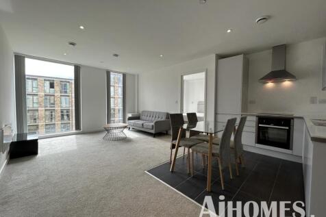 Welcome to this charming two-bedroom apartment located on Boundary Lane in the vibrant city of Manchester. Spanning an impressive 721 square feet, this property offers a perfect blend of comfort and m