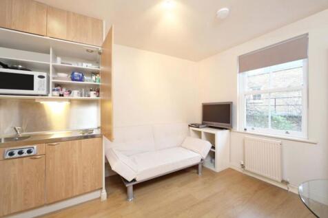 Stunning studio is presented in immaculate condition. The property comprises a generous studio room, with a sleeping area, dining table and cleverly designed kitchenette, a separate shower and W.C. Th