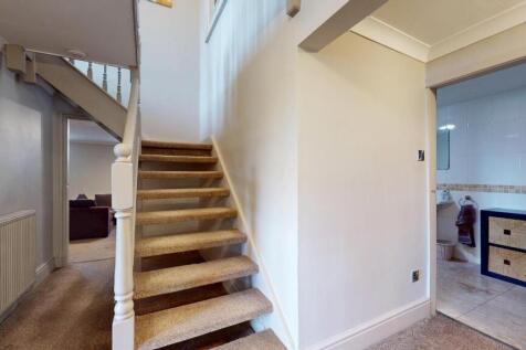 LOWER GROUND FLOOR CENTRAL HALLWAY