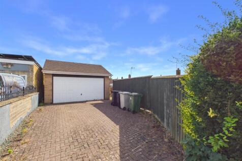 Double Garage & Drive