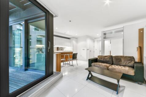 Modern studio suite set with balcony within the stunning Baltimore Wharf, a dockside development. The well-planned accommodation includes a bright studio living room with tiled flooring extending onto