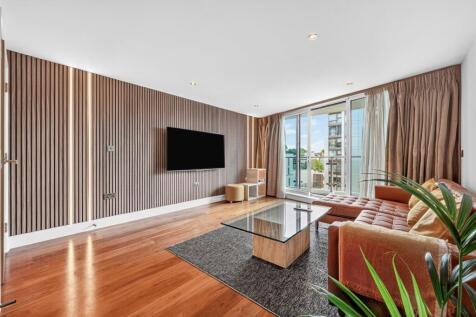 **Short Let** A luxurious 4th floor apartment with dark wood floors throughout, balcony, lift, porter and underground parking (under separate negotiation) in modern development with superb views in Sw