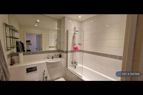 Bathroom With Large Mirror 