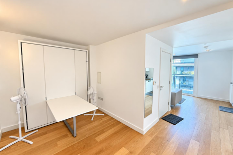 Bright Minimalist Studio Interior.png