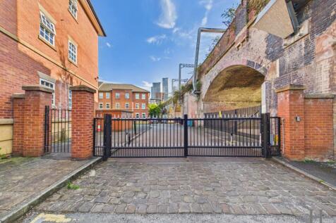 Secure gated entry (access via Wollam Place)