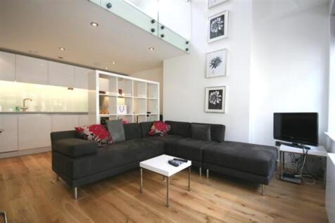 A stunning duplex one bed apartment located in an enviable position off King Street in Manchester, the property retains many original features and benefits from 2 mezzanines and a high specification t