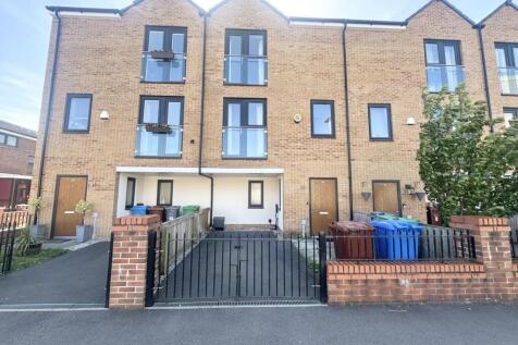 New Build Three Bedroom Townhouse on the Edge of Manchester City Centre. Driveway Parking and Accomodation over Three Floors.