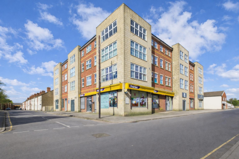 Modern building on quiet Ripley corner.png