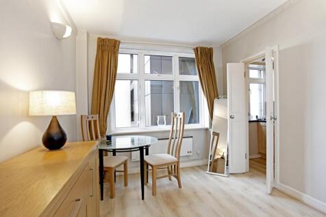 A studio apartment on the third floor in Clifford's Inn, on Fetter Lane.