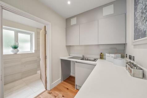 Utility Room to Downstairs Shower Room