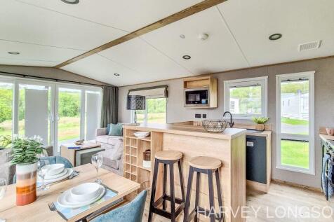 Open-plan living, kitchen and dining area in ABI I