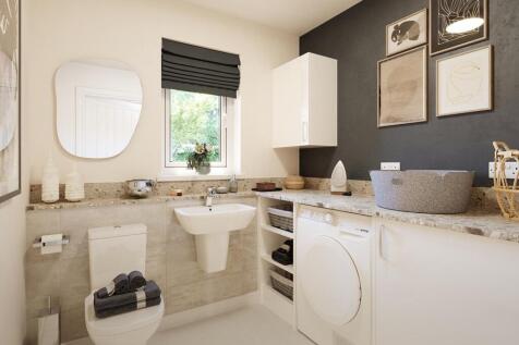 A utility room adds convenience