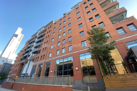 WATCH VIDEO TOUR! Superb two bedroom, two bathroom, furnished apartment in the vibrant Quadrangle development, located just off Oxford Road. Large open plan living space, two double bedrooms, two bath