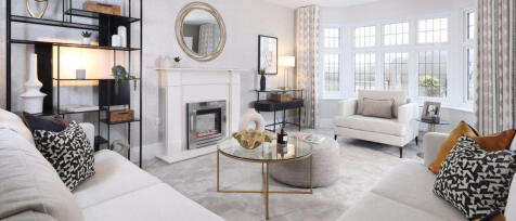 Modern living room with cream sofas, a fireplace, large bay windows, and stylish decor in a bright,
