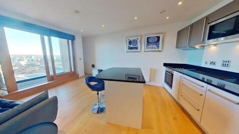 A stunning one-bedroom apartment located in the prestigious Candle House development, Leeds City Centre. Featuring a spacious open-plan living area, modern fitted kitchen with integrated NEFF applianc