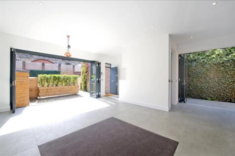 A two double bedroom unfurnished gated mews house located opposite Ravenscourt Park. The house has been finished to a high standard and comprises of an open plan lounge leading onto a dining area and