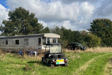 With a mobile home.