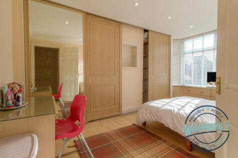 Main bedroom fitted wardrobes