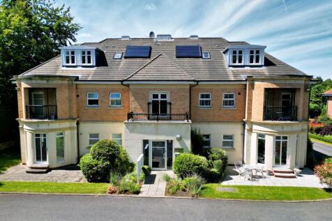 Unfurnished two bedroom, two bathroom top floor apartment with two allocated parking spaces. Located in an exclusive gated development and available in August