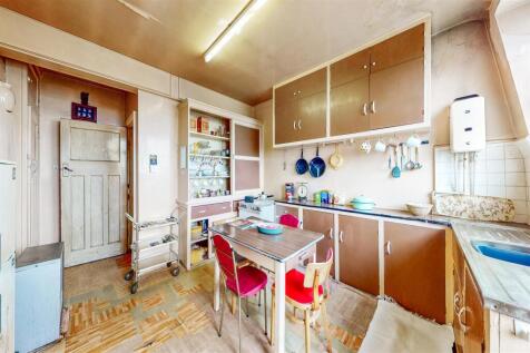 Door to terrace and stairs down to garden from kit