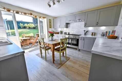 2 KITCHEN WITH A VIEW OUT TO PATIO.jpg