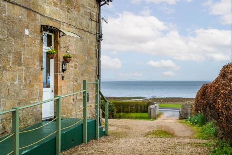 Front door and driveway view