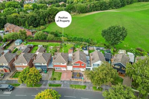Aerial View of Property and Fields Behind