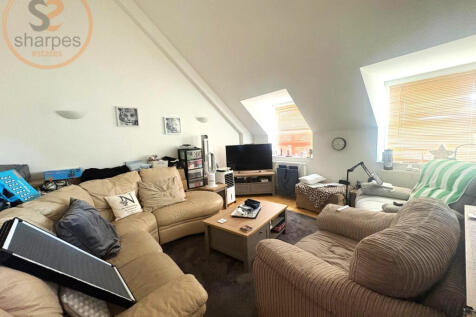 This spacious top floor loft style apartment in Worcester Park, Greater London offers a comfortable and modern living space. The open plan kitchen is perfect for entertaining guests, and the newly fit