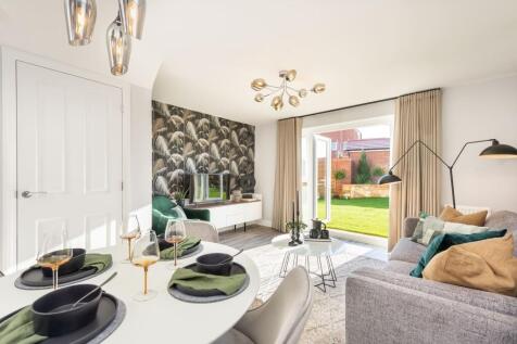 Norbury open-plan lounge and dining area with French doors onto the garden