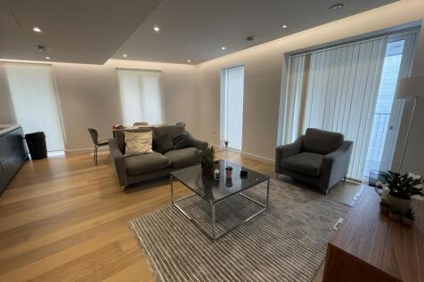 A stylish two-bedroom, two-bathroom apartment with a private balcony in the prestigious Postmark development, offering luxury Zone 1 living with exceptional resident amenities and transport links.