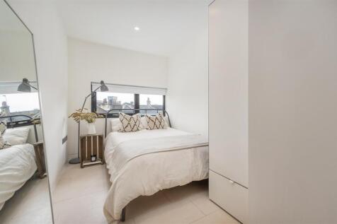 A stunning two bedroom first floor apartment set within a secure apartment block situated moments from Primrose Hill and Regent's Park. This superb property comprises a principal bedroom with built in