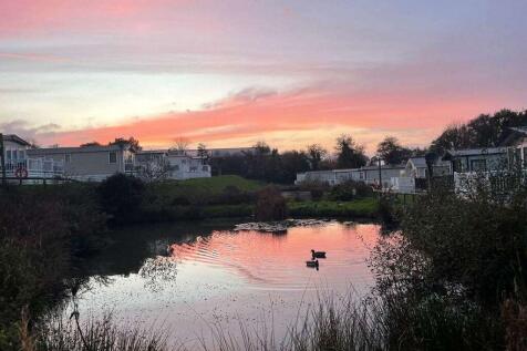 Pond at Sunset at Hedley Wood Holiday Park, Cornwa