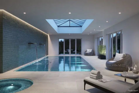 An exceptional and extensively refurbished detached family residence, set behind a grand gated driveway on the prestigious Bishops Avenue. This impressive home features luxurious amenities including a