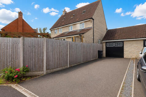 Rear and driveway