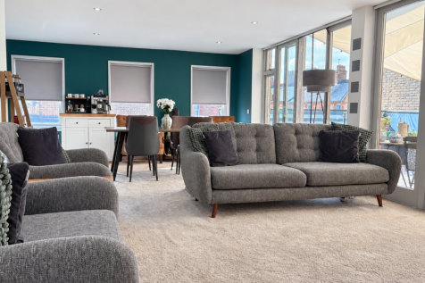 Bright teal-walled interior with natural light-6