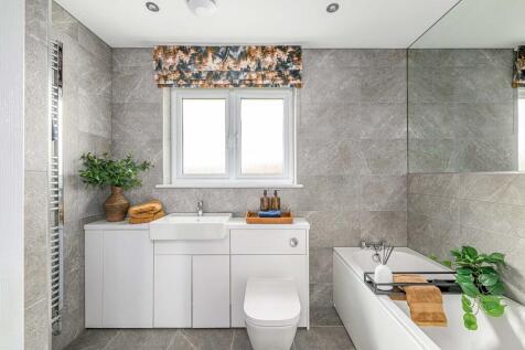 Family bathroom with bath and shower