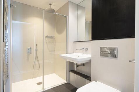 Experience luxury in this elegantly designed bathroom with modern amenities.