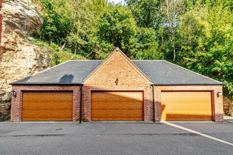 Double garage with electric roller door