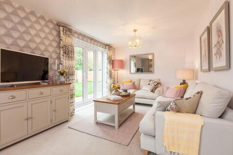 Double doors open to the garden, creating a seamless indoor-outdoor flow