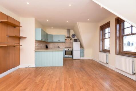 Bright and spacious one bedroom flat with a separate study situated on the top floor of the period conversion above shops on St Johns Wood High Street.